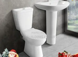 Close-Coupled Water Closet and Pedestal Wash Basin Set.
