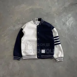 Thom Browne Half-and-Half Varsity Jacket.
