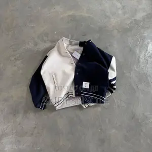 Thom Browne Half-and-Half Varsity Jacket.