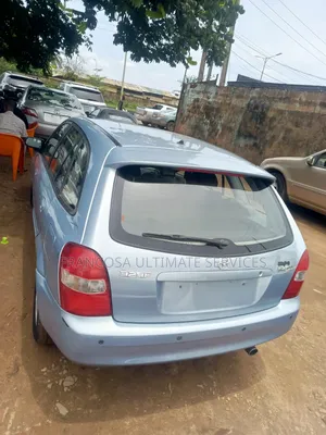 Mazda 323 2004 Blue