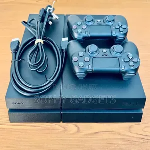Ps 4 Fat With 2 Pads and 12 Games
