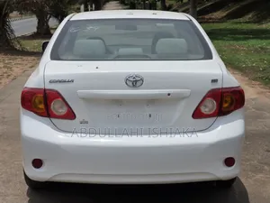 Toyota Corolla LE 4dr Sedan (1.8L 4cyl 4A) 2010 White