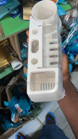White Plastic Wall-mounted Dental Toothbrush And Toothpaste Holder