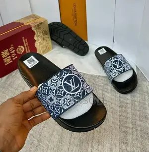 Lily Flat Mule by Louis Vuitton.