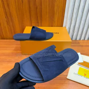 Luxury Update  
Louis Vuitton Portofino Mule in Suede.