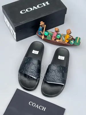 Coach Udele Signature Embossed Slides