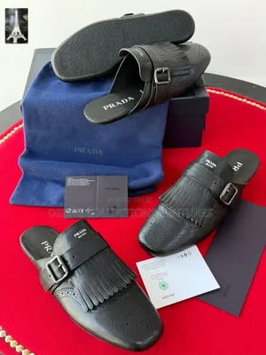 *Original Prada Shuffle Fringed Leather Mules Available in Store 