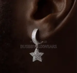 VVS Moissanite Sterling Silver Hoop Earring With a Star-Shaped End.