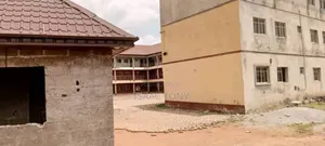 30 Plots of Land With a School and Building in Ota for Sale