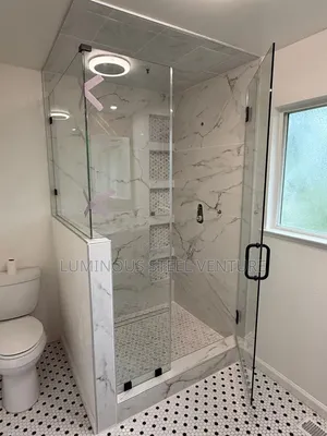 This Design Is Often Referred to as a Half-Wall Shower Enclosure, 