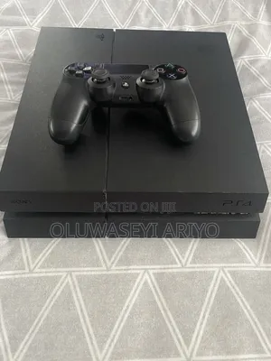 Barely Used Clean Ps4 With 1 Wireless Pad and 5 Games Installed