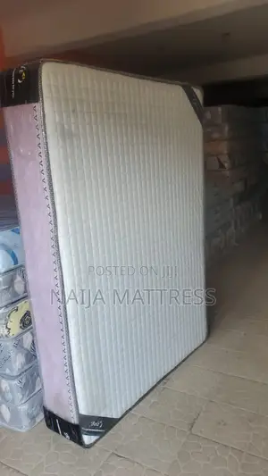 4.5 by 12 Spring Mattress With Topper
