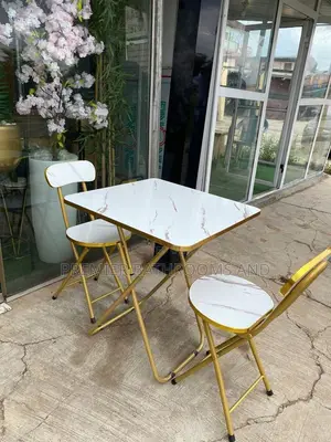 White and Gold Table and Chairs