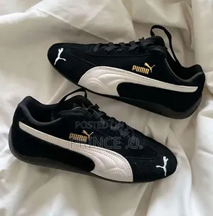 Black  White Striped Suede Puma Sneakers