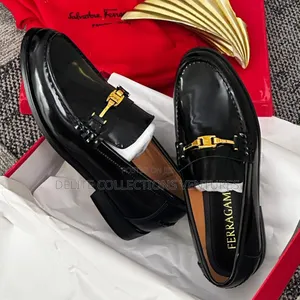 Update  
Salvatore Ferragamo Embossed-Gancio Loafers.
