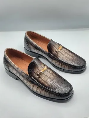Italian Gucci and Ferragamo Loafers Available