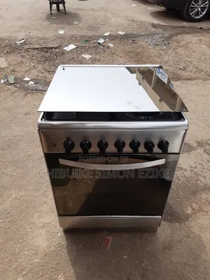 Four Burner Gas With Electric Oven Very Clean