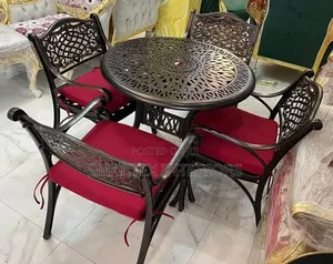Solid Round Cast Metal Table With Chairs