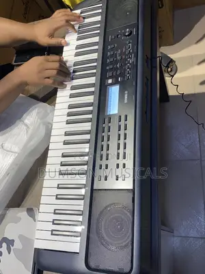 Yamaha PSR-E383 Portable Keyboard 61 Keys (Adaptor Included)