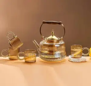 Borosilicate Heat Resistant Glass Tea Jug and 4 Tea Cups