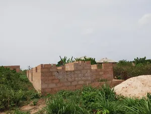 Half Plot Of Land With 5 Apartment Of Room And Parlor Self Contain