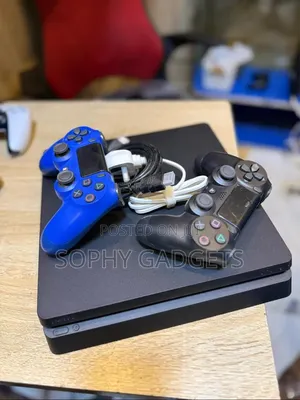 Uk Used Ps 4 Slim and Pads