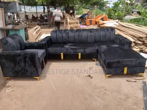 A Standard L Shape Couch and Single