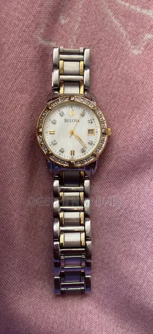 Bulova Women's 98r107 (Real Diamond Accented) Calendar Watch.