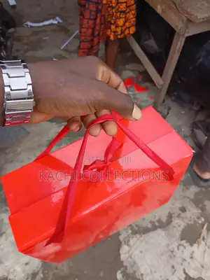 Collapsible Gift Box With Red Ribbons