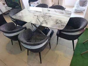 Exotic Dining Table Set by 6 Chairs.