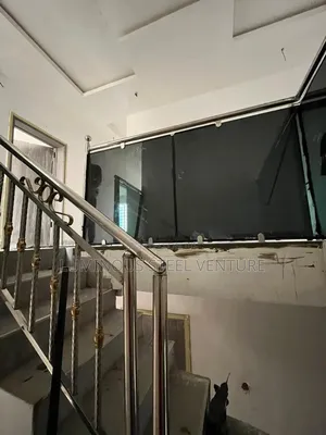 Here in Our Photo You Can See Glass Rail With Stainless Handrail 