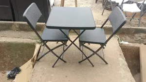 Set of Foreign Folding Chairs and Tables