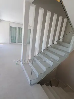 Glass Staircase Railing Installation | Frameless Balustrade Lagos