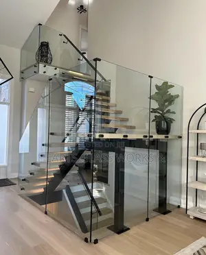 Turn Your Stairs Into a Statement With Our Glass Rails System.