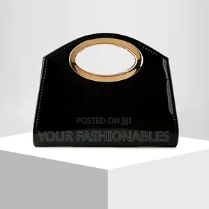 Oval Gold Trim Handle Clutch Purse ( Patent)