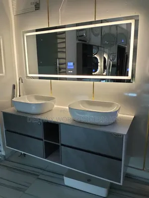 Wall-Hung Cabinet, Double Vessel Sinks, and an Led-Lit Mirror