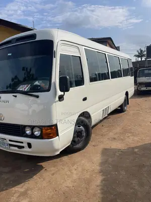 Coaster Hiace Bus for Rental Services
