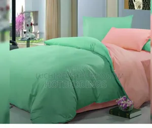 A Set of Duvet, Duvet Cover, Bedsheet and 4 Pillow Cases