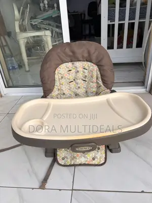Graco Space Saver Feeding Chair With Double Tray and Cup Holder