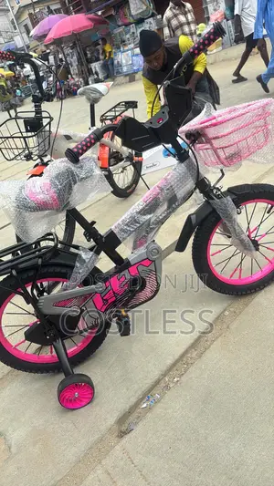16-Inch Bicycle With Pink Accents and Training Wheels.