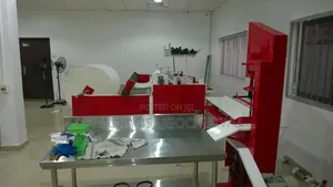 Toilet Rolls Making Machine.