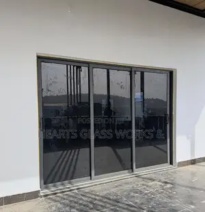Aluminium Ghana Sliding With Dark Grey Glass