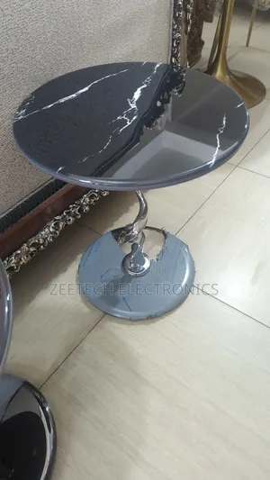Modern Side Table With a Marble-Style Top and a Silver Chrome Base