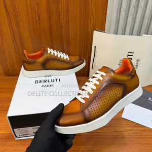 Berluti Stellar Sneakers in Perforated Venezia Calf Leather.