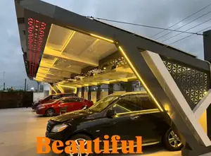 Contemporary Cladded With Light Modern Carport