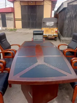 Imported Executive Conference Table With 7 Sturdy Padded Chairs