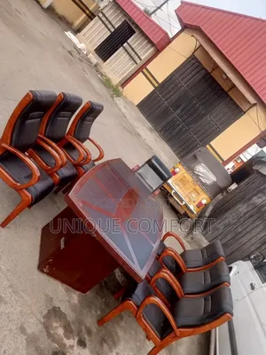 Imported Sturdy Conference Table With 7 Sturdy Padded Leather Chairs