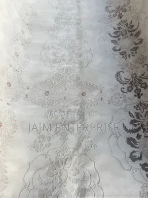 6.6 by 9.6 Swiss Cream Center Rug