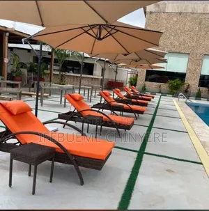 Black With Orange Cushion Pool Side Bed