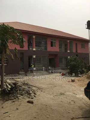 One Story Building Seating on a 3 Plots of Land at Igwurutali
